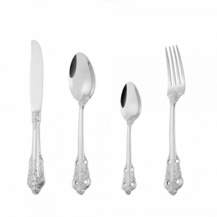 Antique-finish cutlery set arranged on a surface